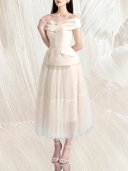 2023 חדש נישה עיצוב נשים חצאית להגדיר קו נטוי הצוואר העליון רשת קצוץ גבוה מותן חצאית שני חלקים שמלה בצבע אחיד בסגנון צרפתי